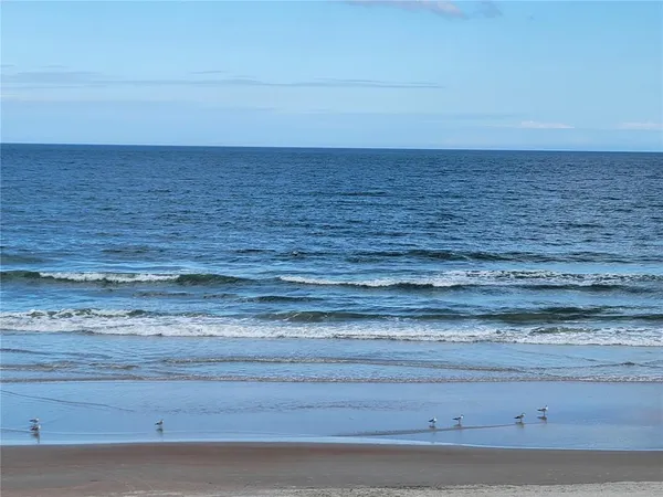 a view of beach and an ocean beach