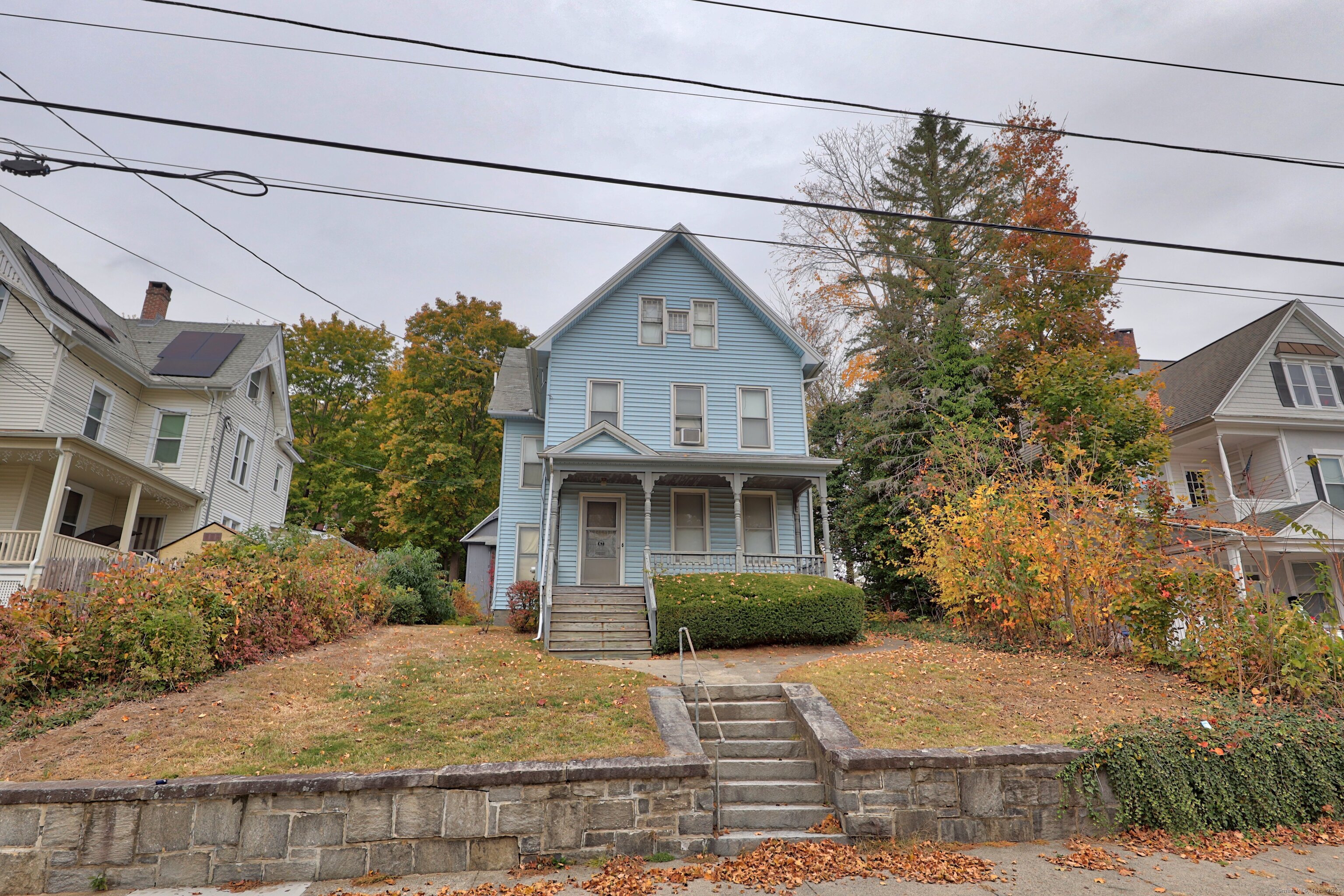 47 Cottage Avenue Ansonia, CT 06401 - Photo 1 of 38 a front view of a house with a yard and garage