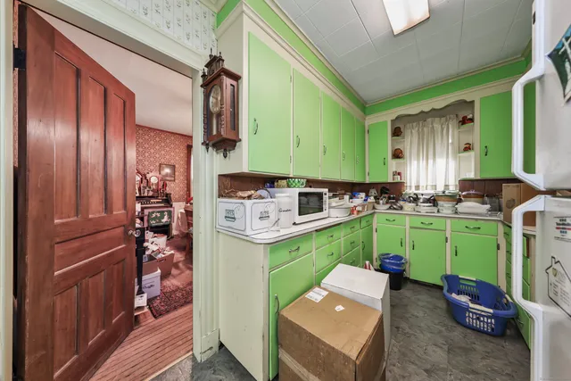 a bed room with a bed furniture and a chandelier