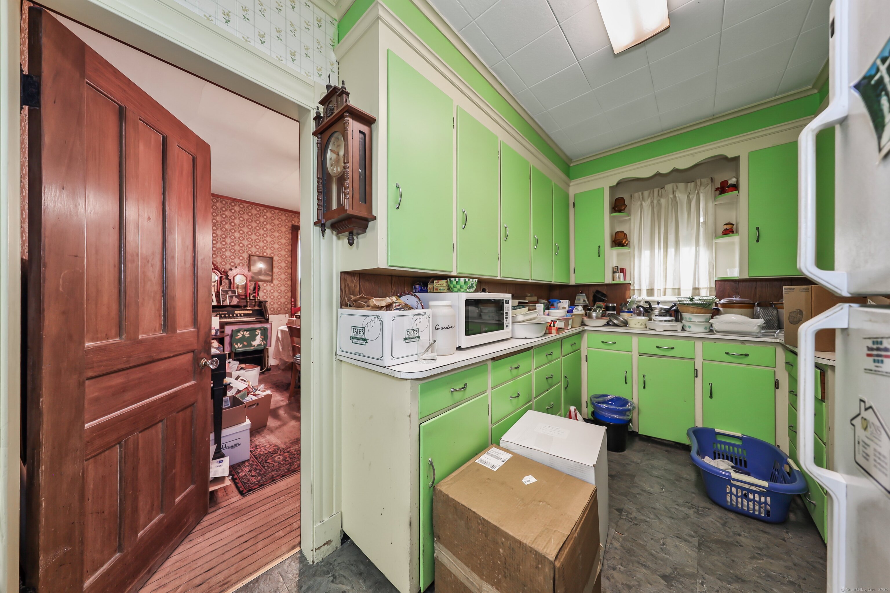 47 Cottage Avenue Ansonia, CT 06401 - Photo 14 of 38 a room with washing machine and a window