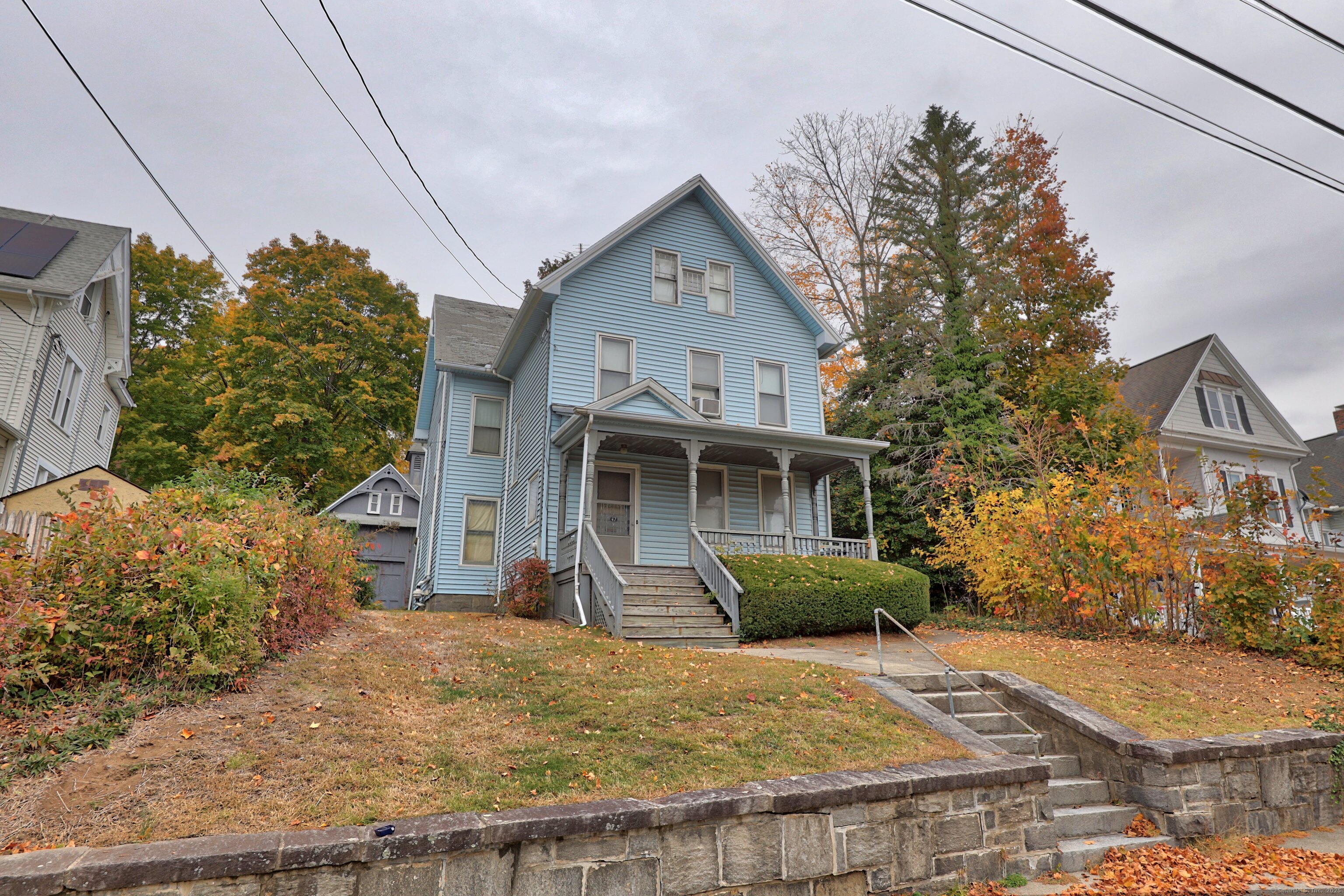 47 Cottage Avenue Ansonia, CT 06401 - Photo 2 of 38 a front view of a house with garden