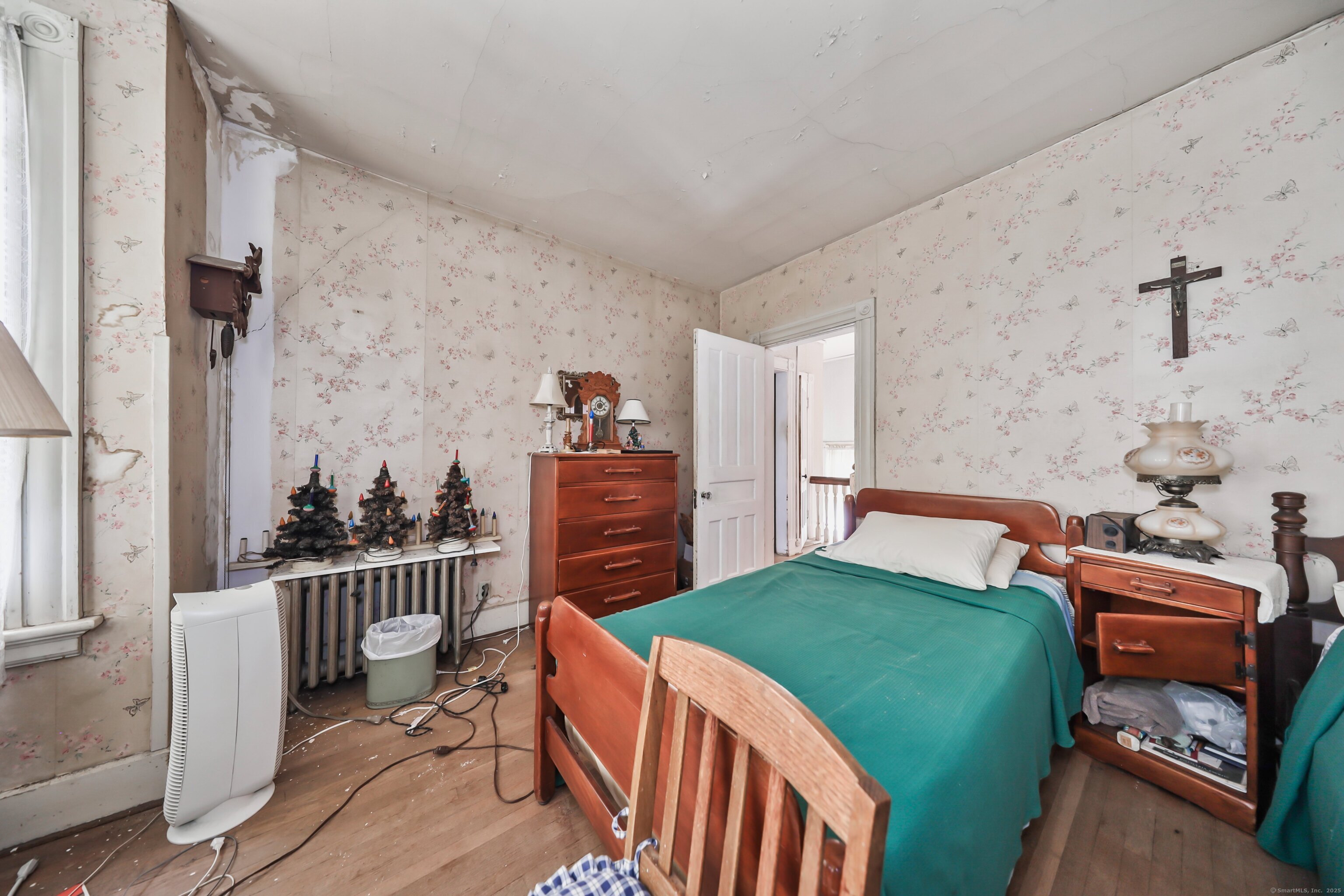 47 Cottage Avenue Ansonia, CT 06401 - Photo 21 of 38 a bedroom with furniture and a wooden floor