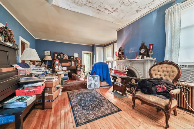 a living room filled with furniture and a rug