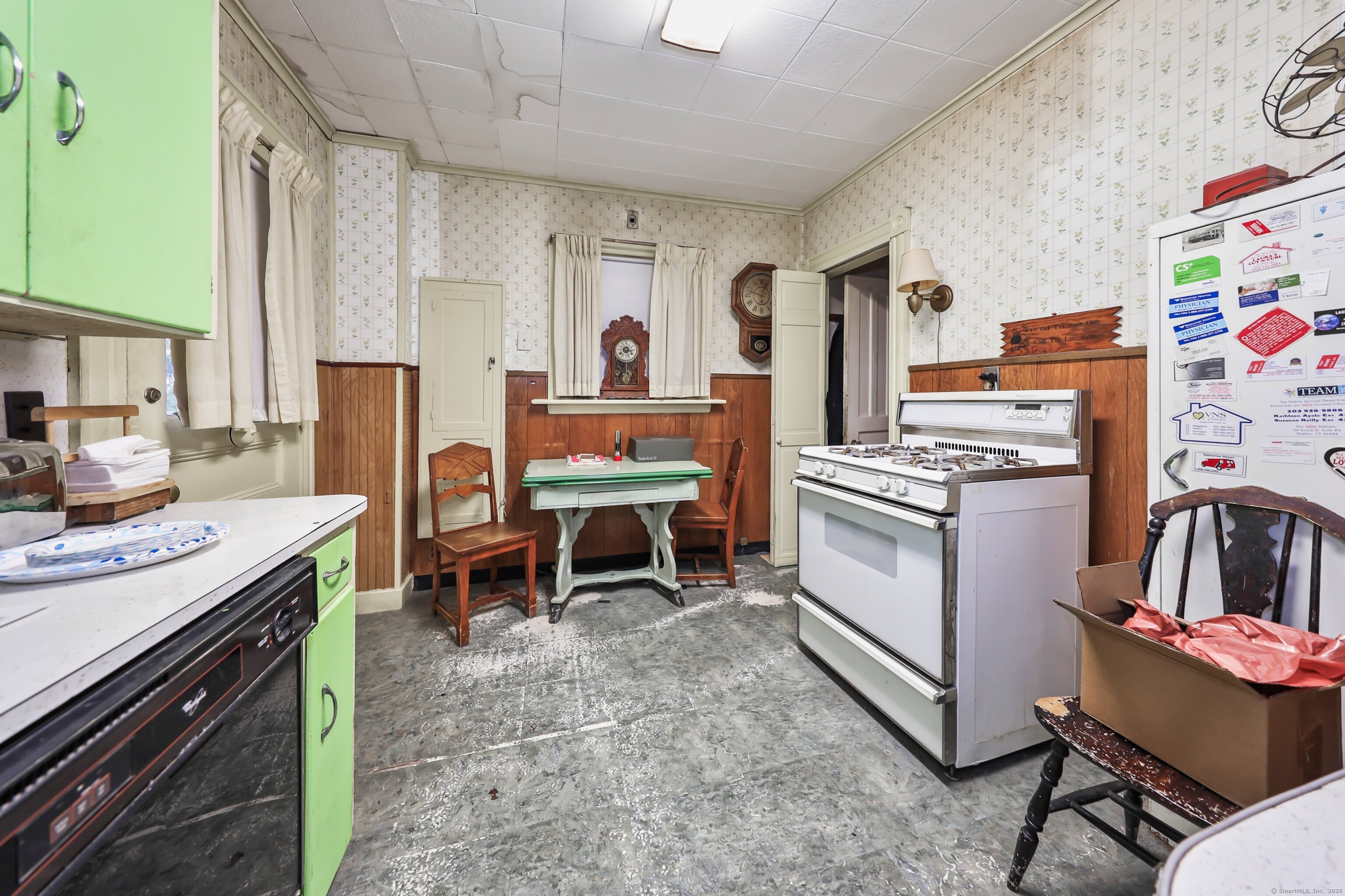 47 Cottage Avenue Ansonia, CT 06401 - Photo 10 of 38 a kitchen with stainless steel appliances a stove a sink and a refrigerator