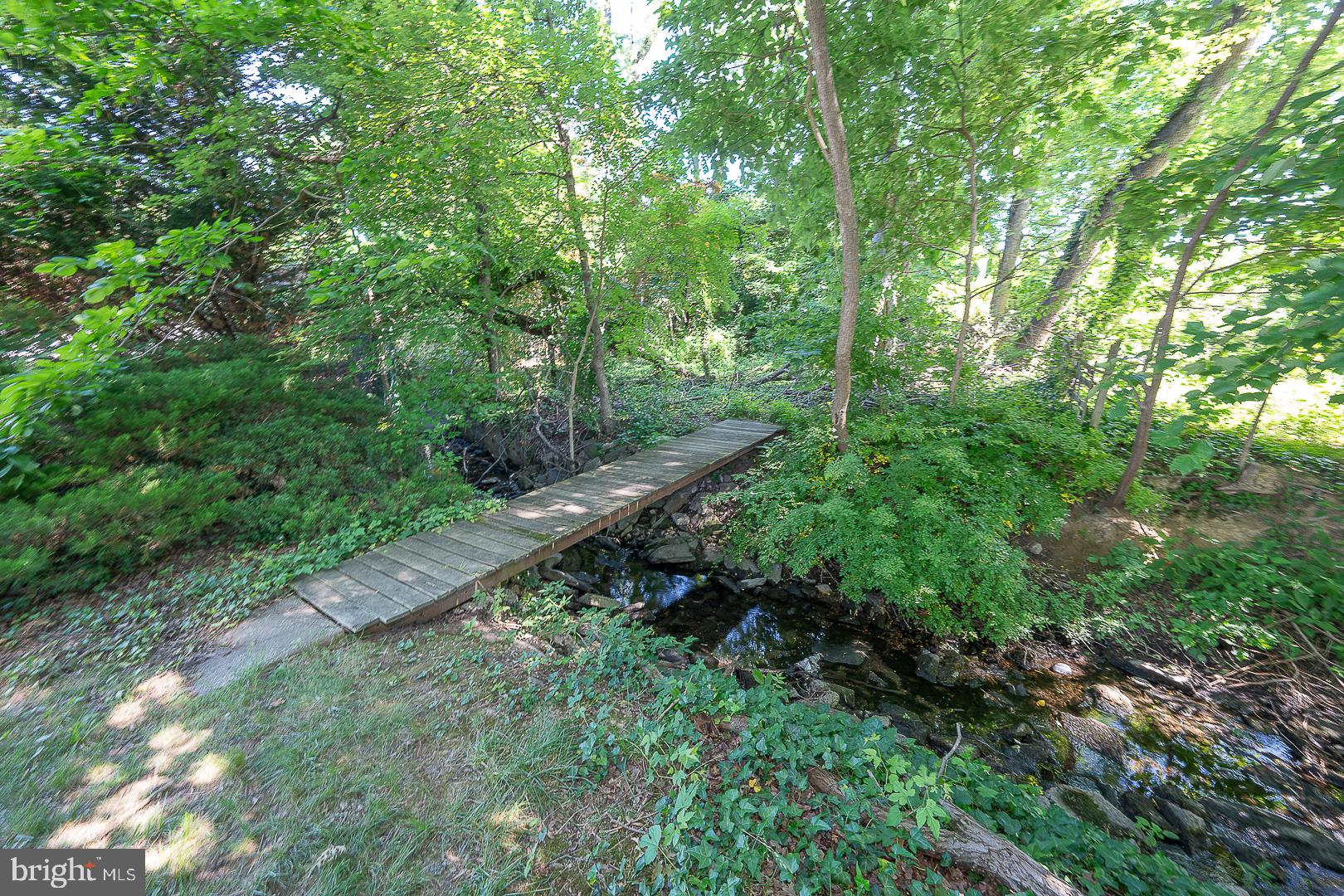 437 Rittenhouse Circle Havertown, PA 19083 - Photo 43 of 55 Tranquil bridge over a babbling brook.