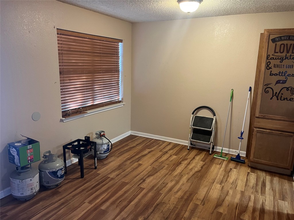 1012 Farm To Market Road 1237 Temple, TX 76501 - Photo 18 of 29 a room with chairs and a wooden floor