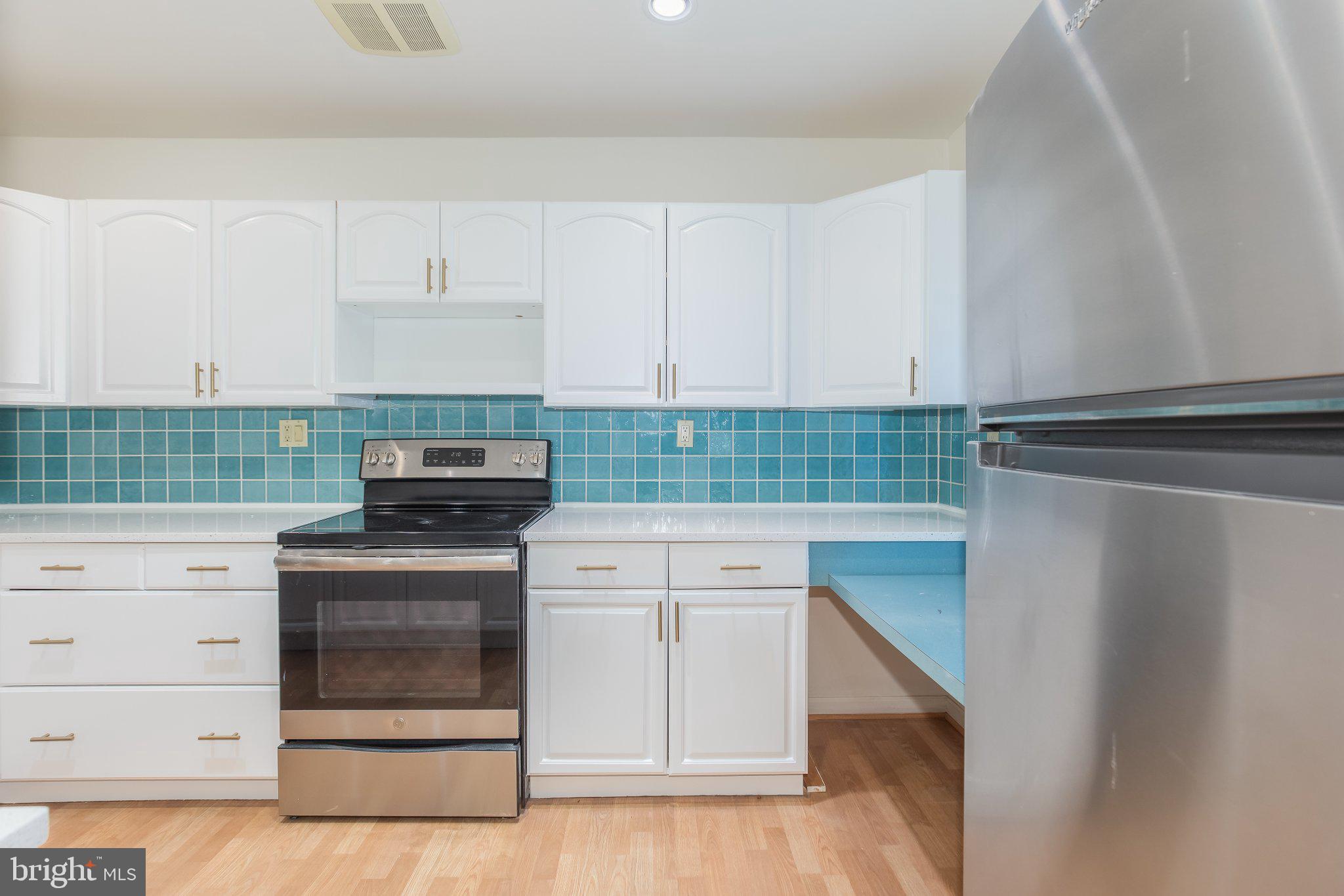 623 I Street Southwest Washington, DC 20024 - Photo 6 of 41 Bright kitchen with modern finishes.
