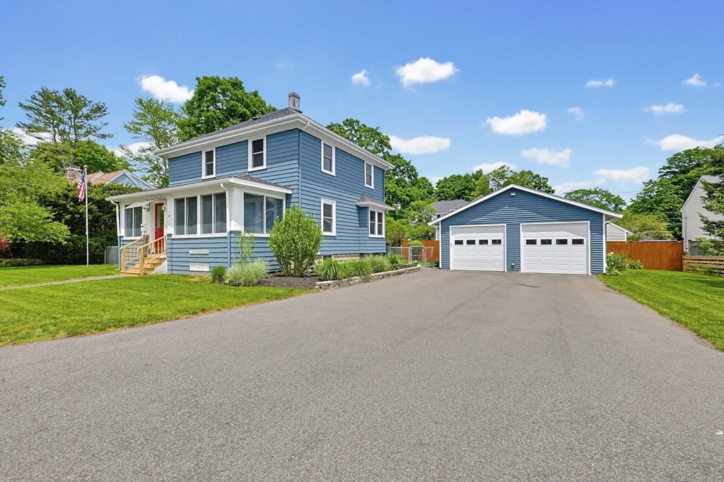 10 Water Street Natick, MA 01760 - Photo 27 of 35 a front view of house with yard and green space