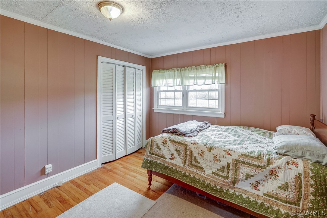 17110 Egglestetton Road Amelia Court House, VA 23002 - Photo 20 of 50 a bedroom with a bed and window