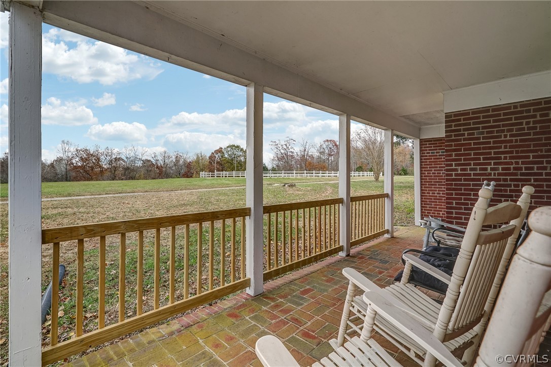 17110 Egglestetton Road Amelia Court House, VA 23002 - Photo 22 of 50 a view of a balcony with wooden floor