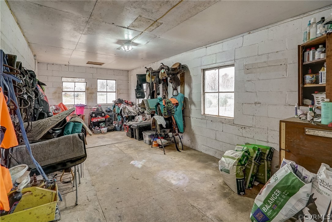 17110 Egglestetton Road Amelia Court House, VA 23002 - Photo 33 of 50 a view of a livingroom with furniture and a potted plant