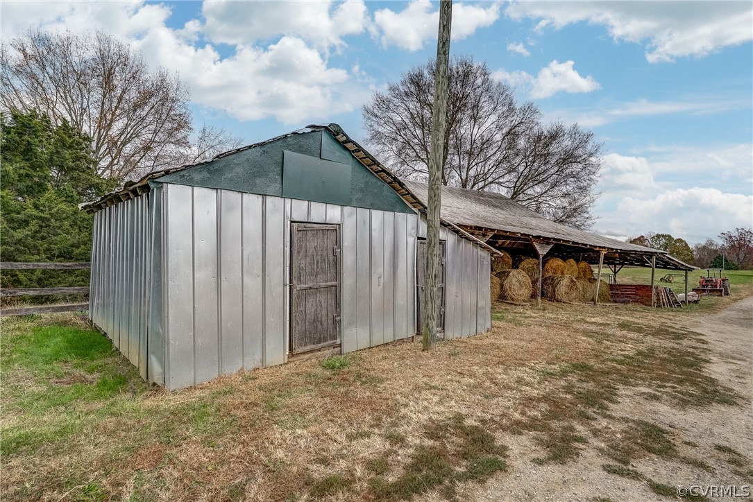 17110 Egglestetton Road Amelia Court House, VA 23002 - Photo 39 of 50 a backyard of a house with lots of green space