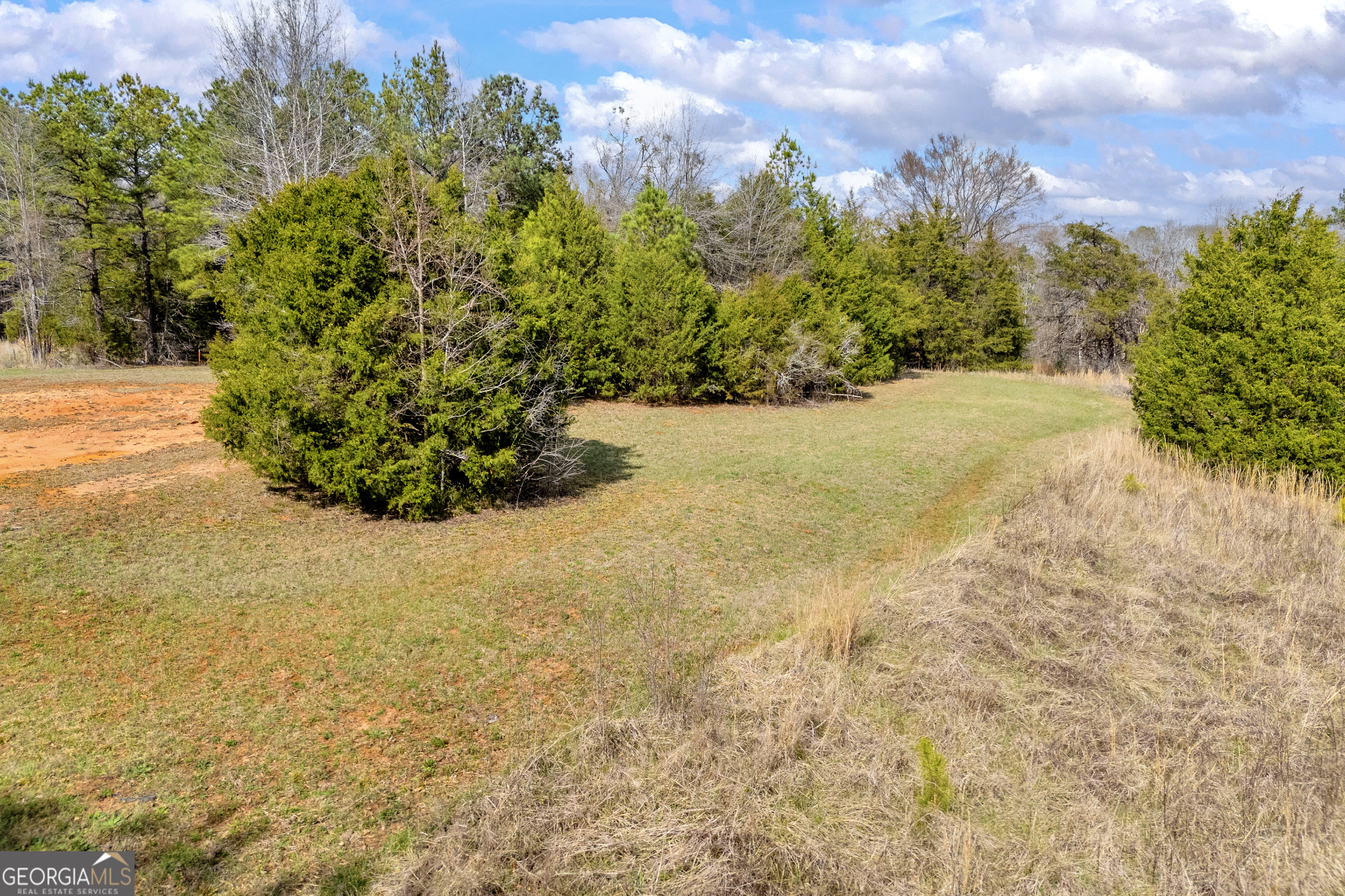 0 Brockton Loop, Unit 2 & 3 Jefferson, GA 30549 - Photo 16 of 25 a view of a garden with an outdoor space