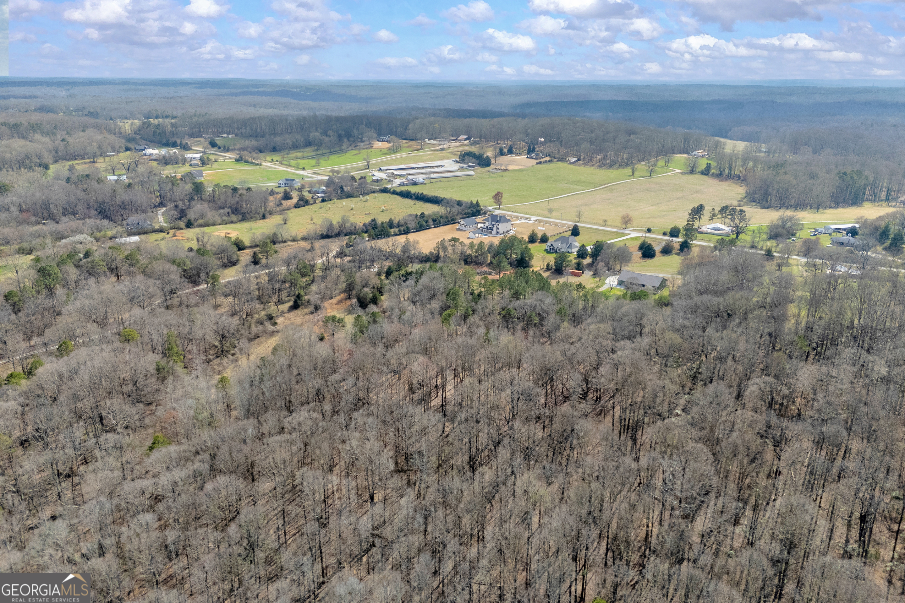 0 Brockton Loop, Unit 2 & 3 Jefferson, GA 30549 - Photo 18 of 25 a view of a lake with a city