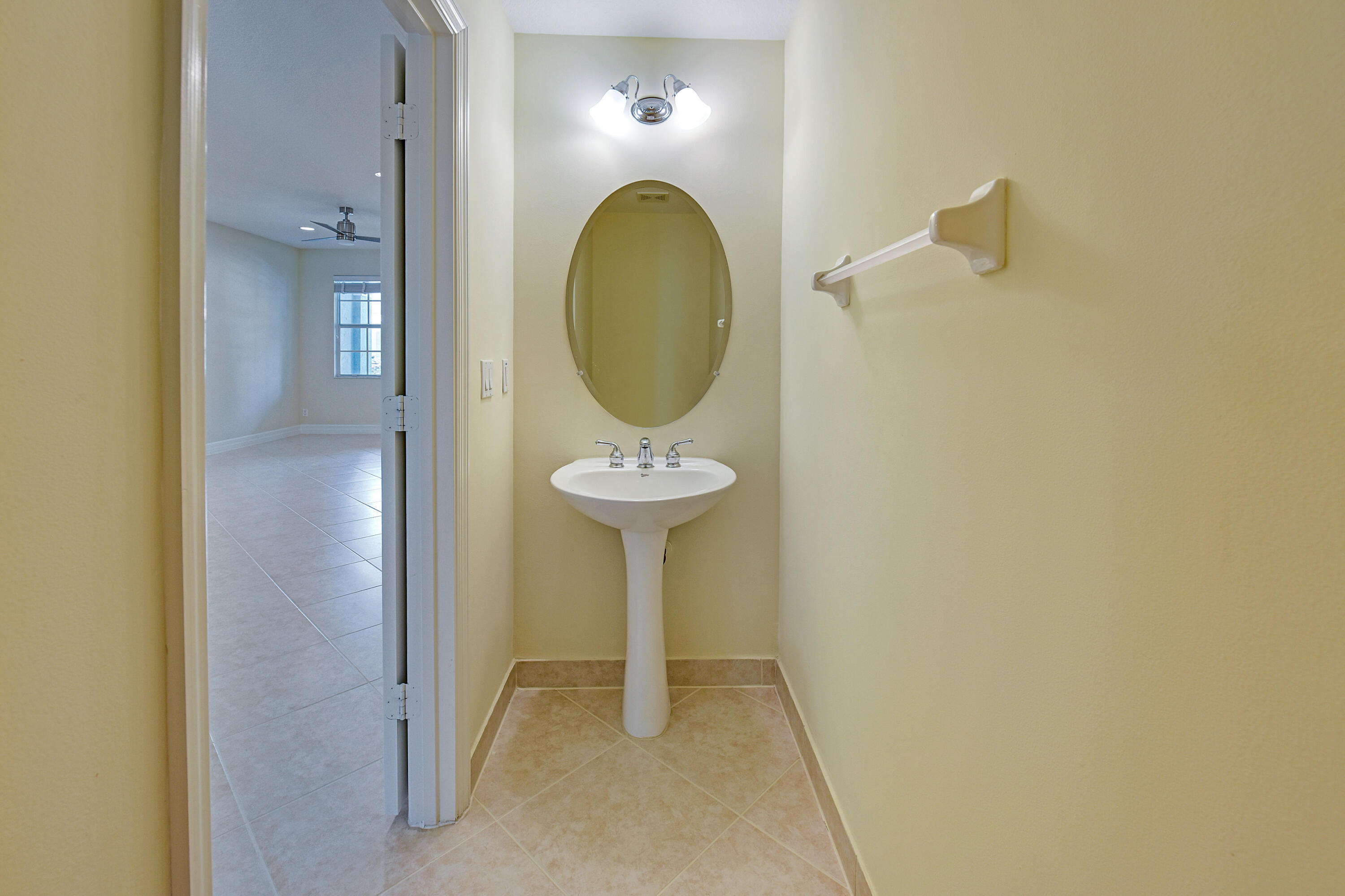 932 Northwest 18th Avenue Boca Raton, FL 33431 - Photo 7 of 35 downstairs half bath