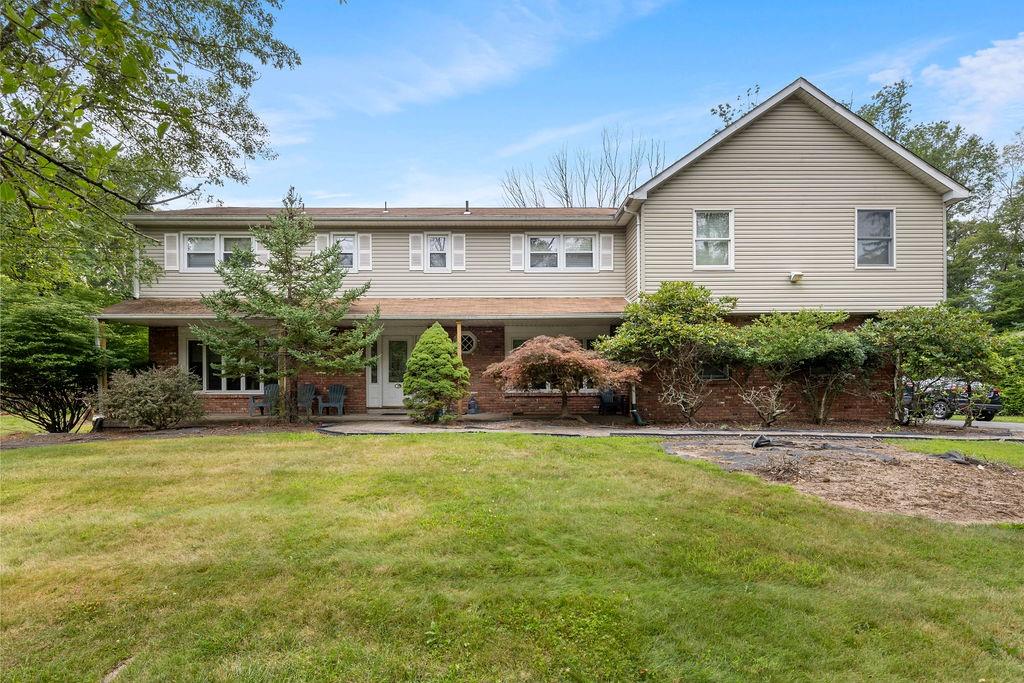 View of front of home with a front yard