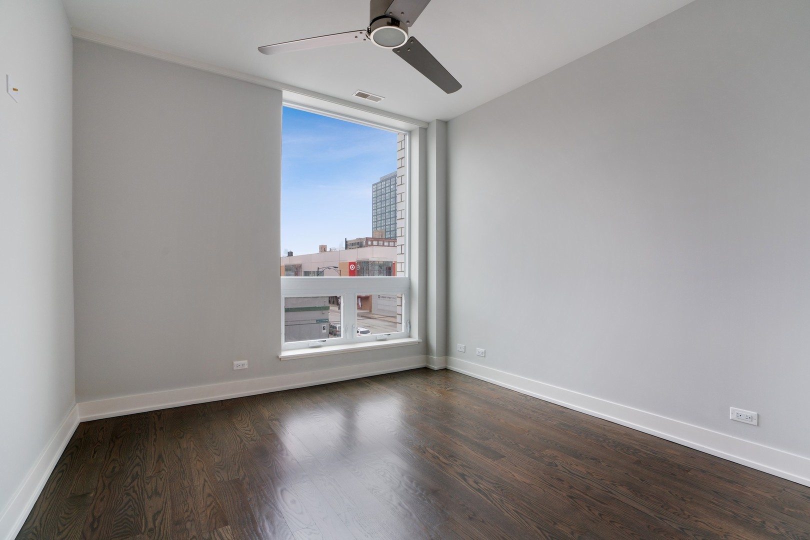 236 South Racine Avenue, Unit 304 Chicago, IL 60607 - Photo 14 of 23 a view of a hardwood floor in a room