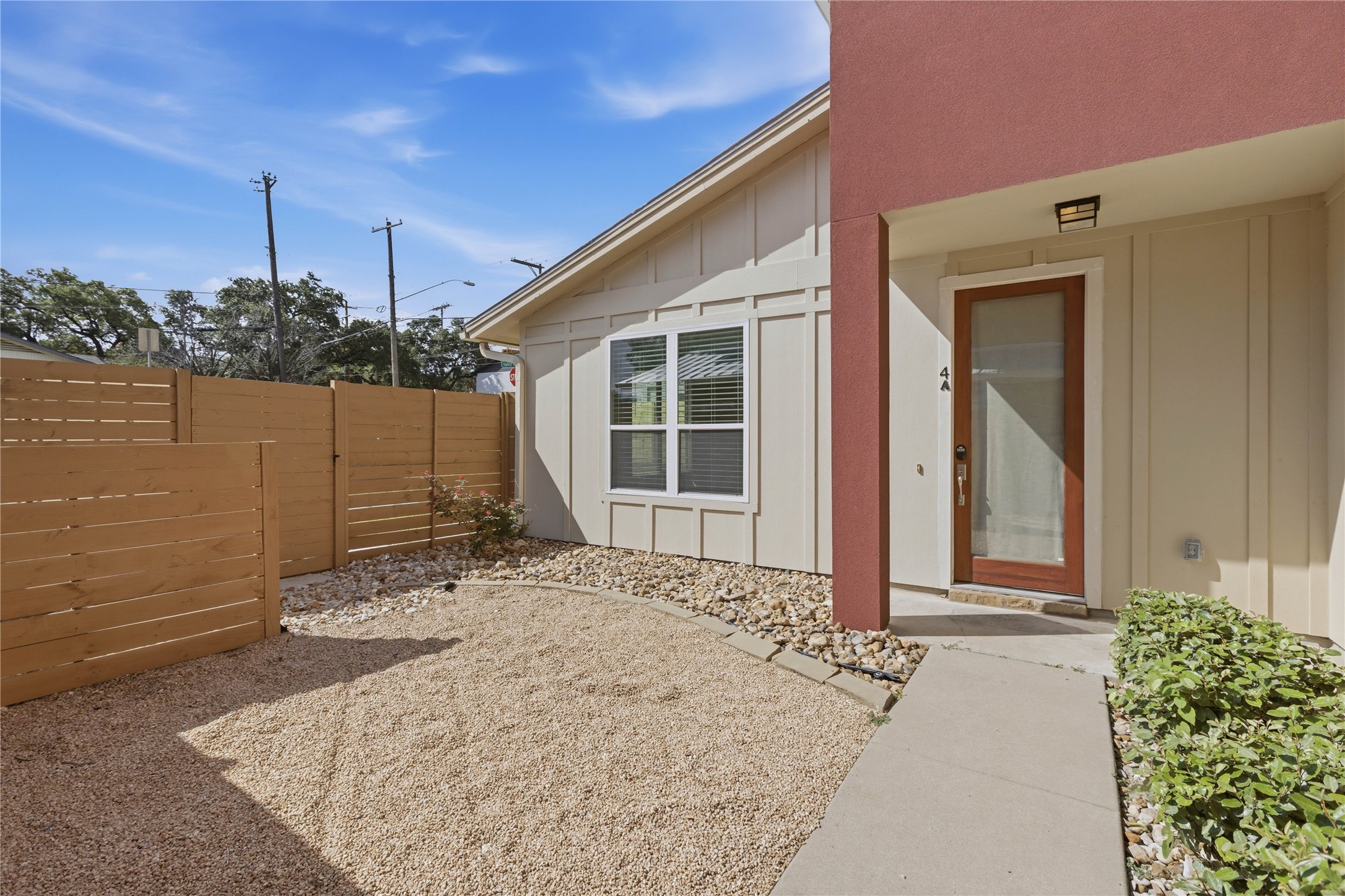 4124 Valley View Road, Unit 4A & 4B Austin, TX 78704 - Photo 22 of 40 A private, gravel courtyard leads to the inviting entrance of this modern-styled home.