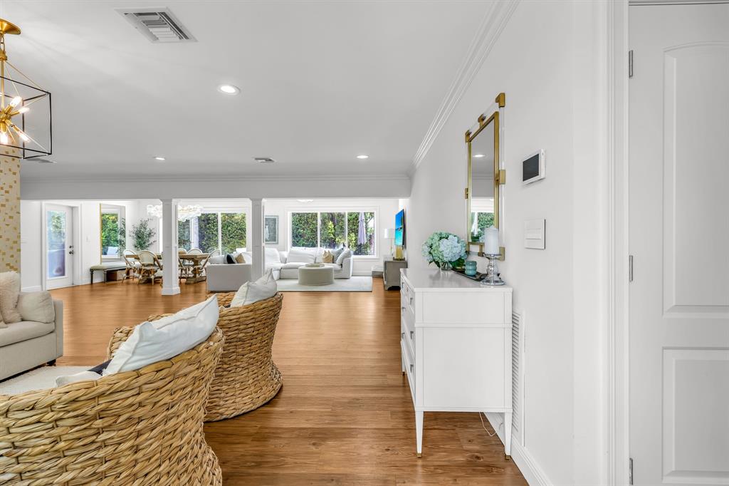 2800 Northeast 21st Avenue Lighthouse Point, FL 33064 - Photo 11 of 58 a living room with fireplace furniture and a wooden floor