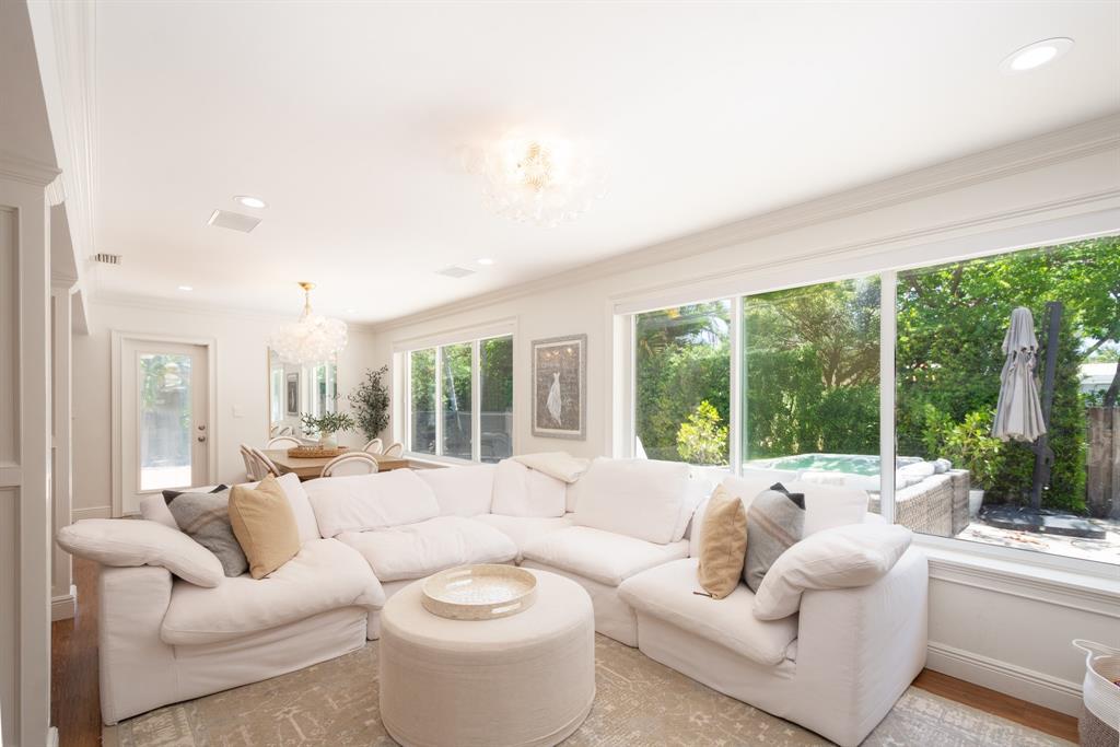 2800 Northeast 21st Avenue Lighthouse Point, FL 33064 - Photo 23 of 58 a living room with furniture and a large window