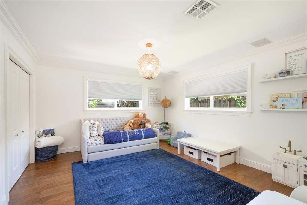 2800 Northeast 21st Avenue Lighthouse Point, FL 33064 - Photo 34 of 58 a living room with furniture and a baby crib