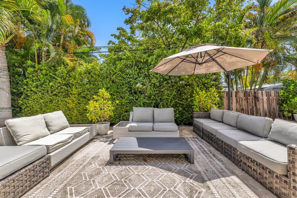 2800 Northeast 21st Avenue Lighthouse Point, FL 33064 - Photo 47 of 58 a view of a patio with a couch
