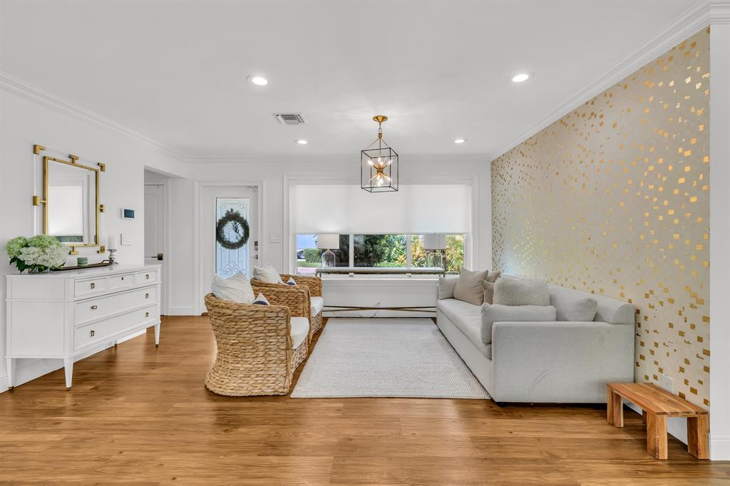 2800 Northeast 21st Avenue Lighthouse Point, FL 33064 - Photo 10 of 58 a living room with furniture and a wooden floor