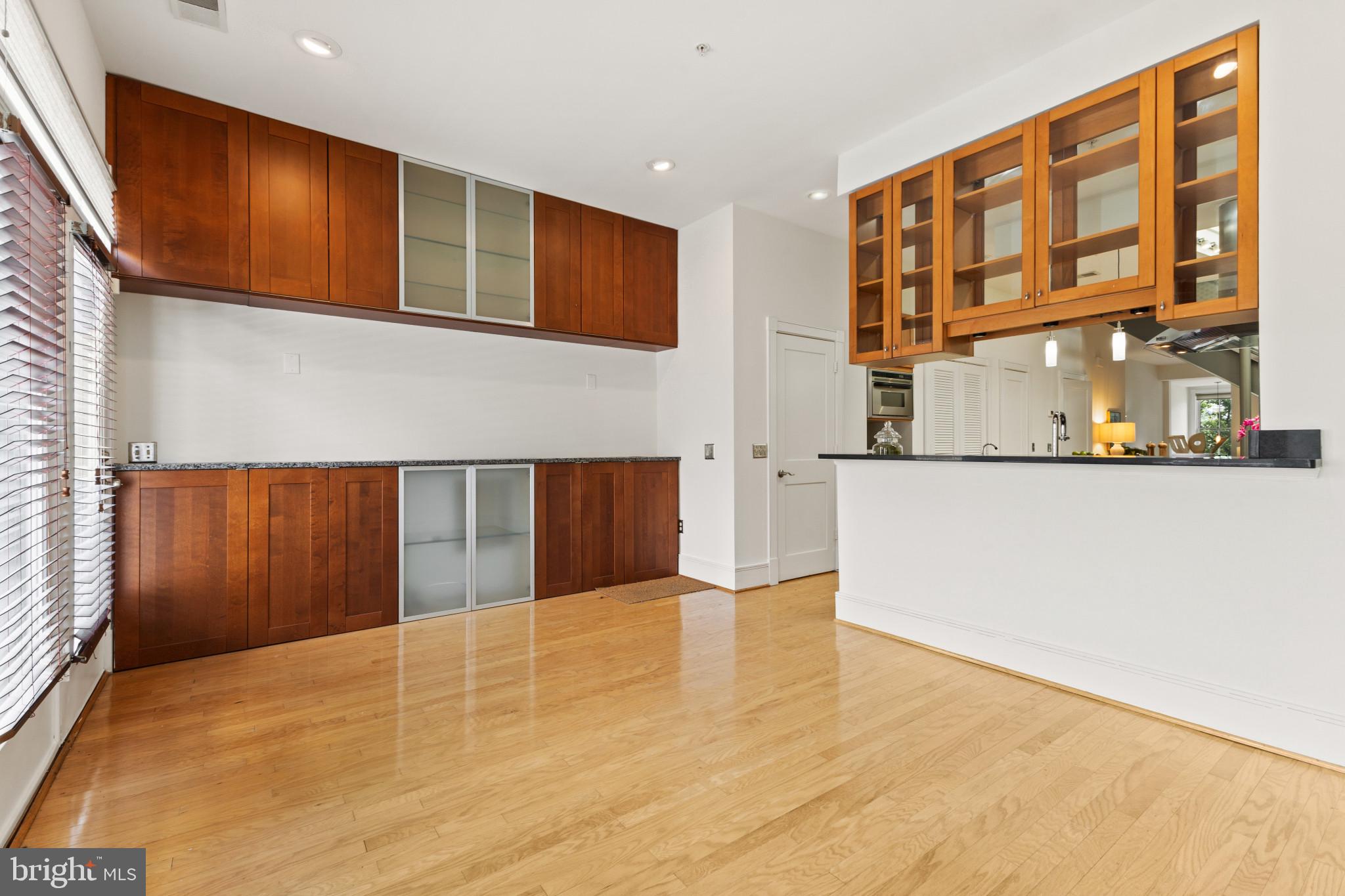 526 13th Street Southeast, Unit B Washington, DC 20003 - Photo 13 of 33 Sleek modern kitchen with warm tones.
