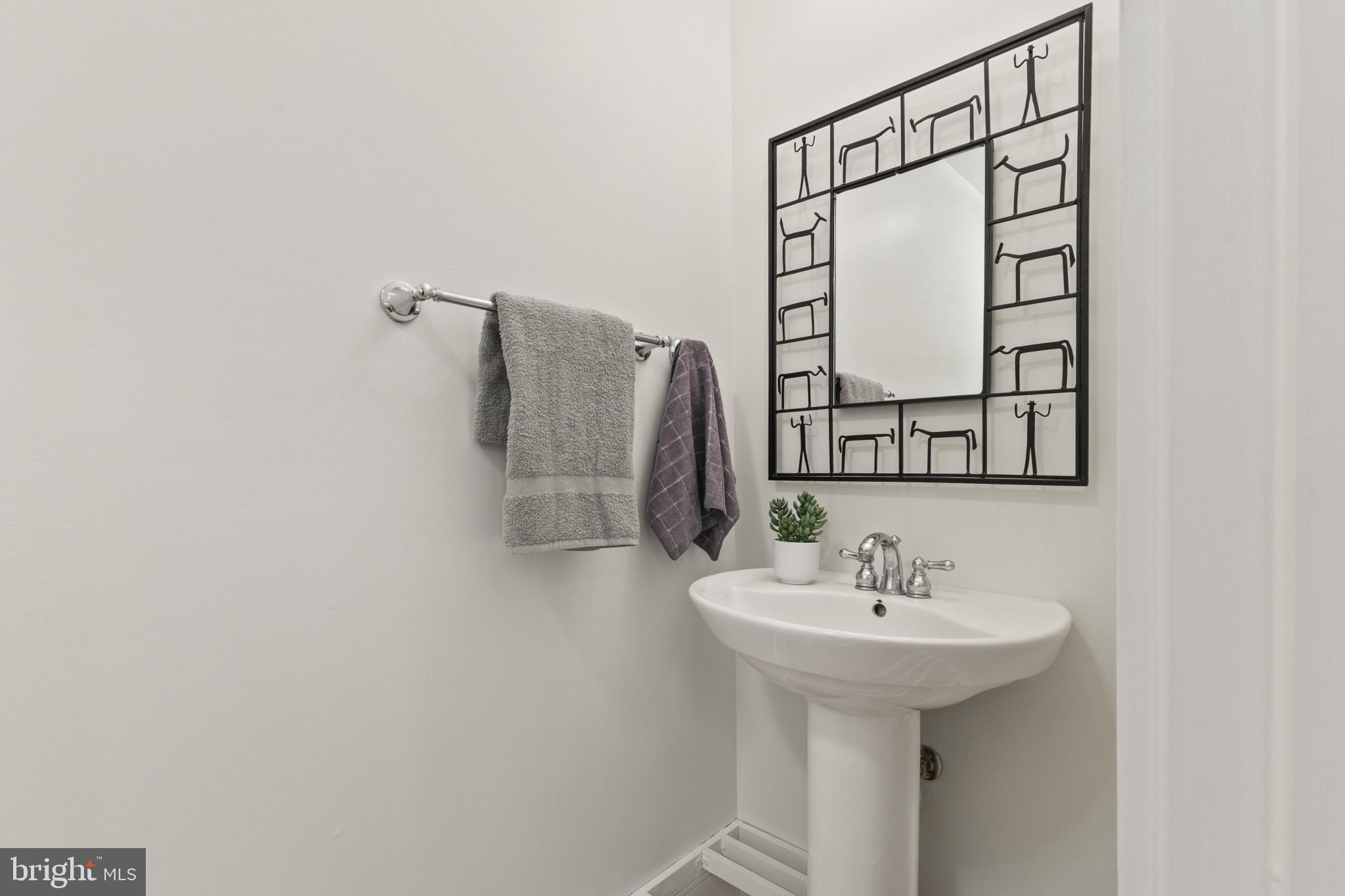526 13th Street Southeast, Unit B Washington, DC 20003 - Photo 28 of 33 Sleek and modern powder room design.
