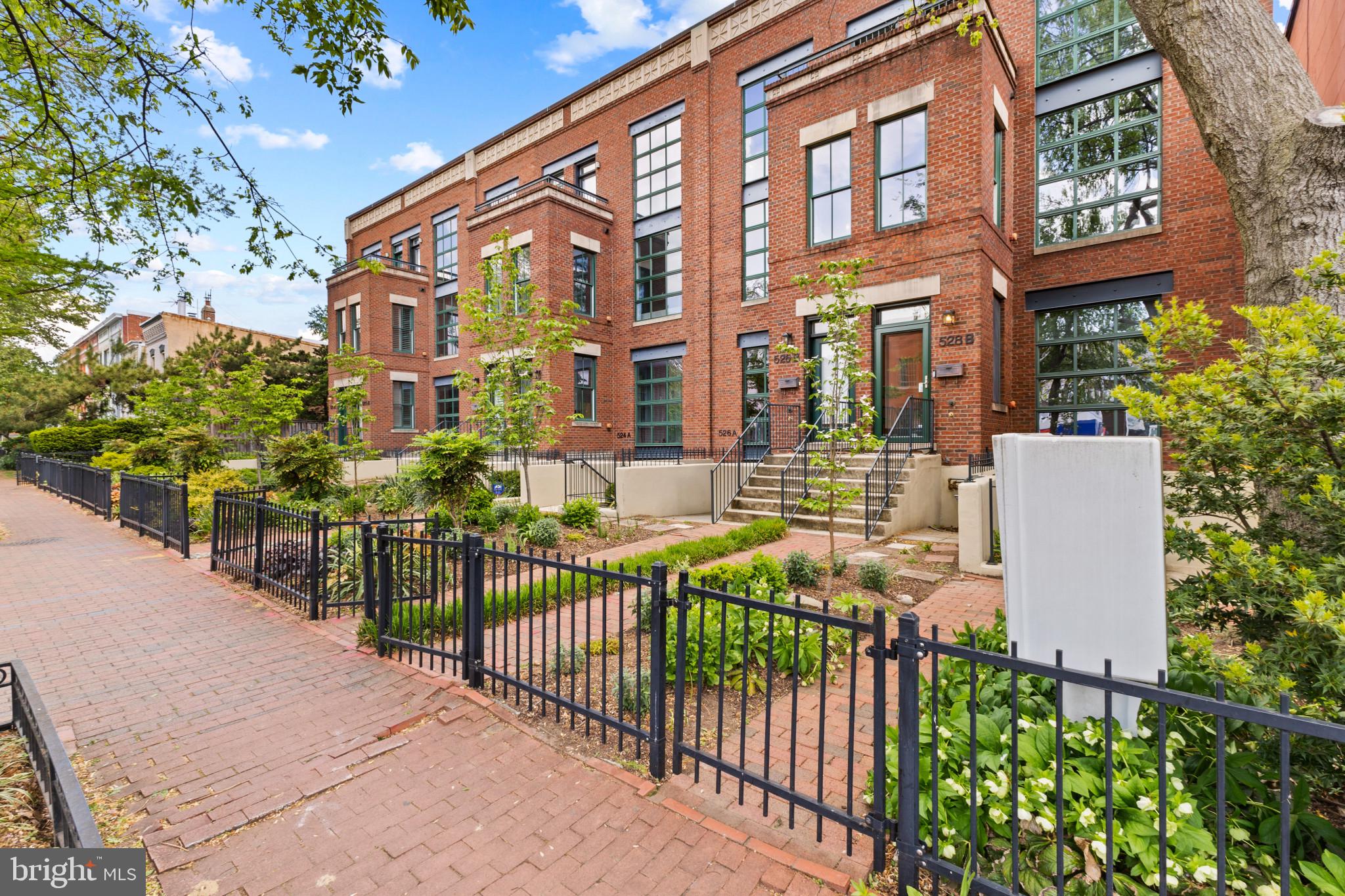 526 13th Street Southeast, Unit B Washington, DC 20003 - Photo 3 of 33 Charming brick townhomes with greenery.