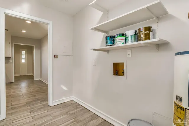 a view of livingroom with furniture and wooden floor