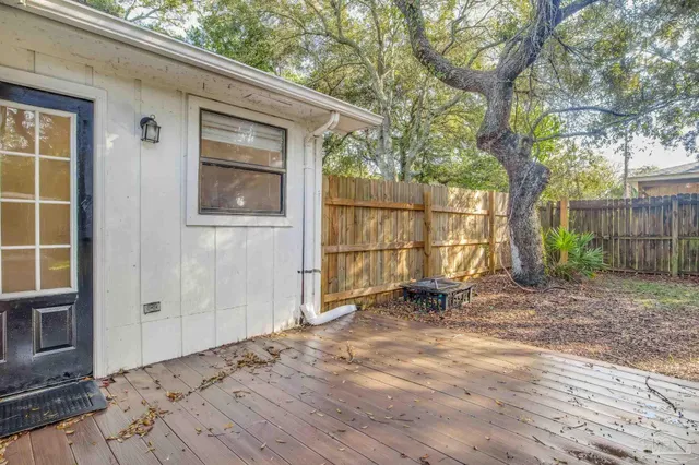 a backyard of a house with seating space