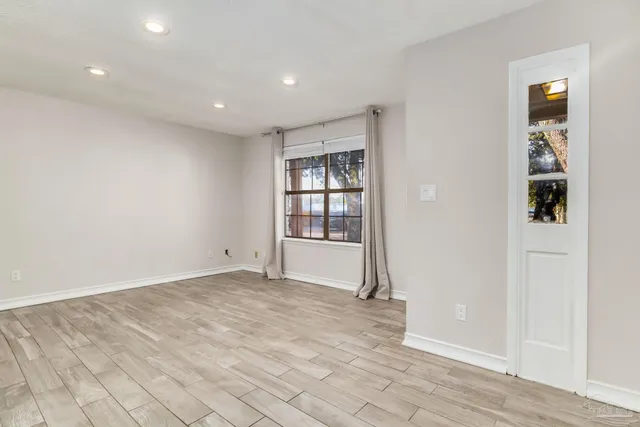 a view of an empty room with window