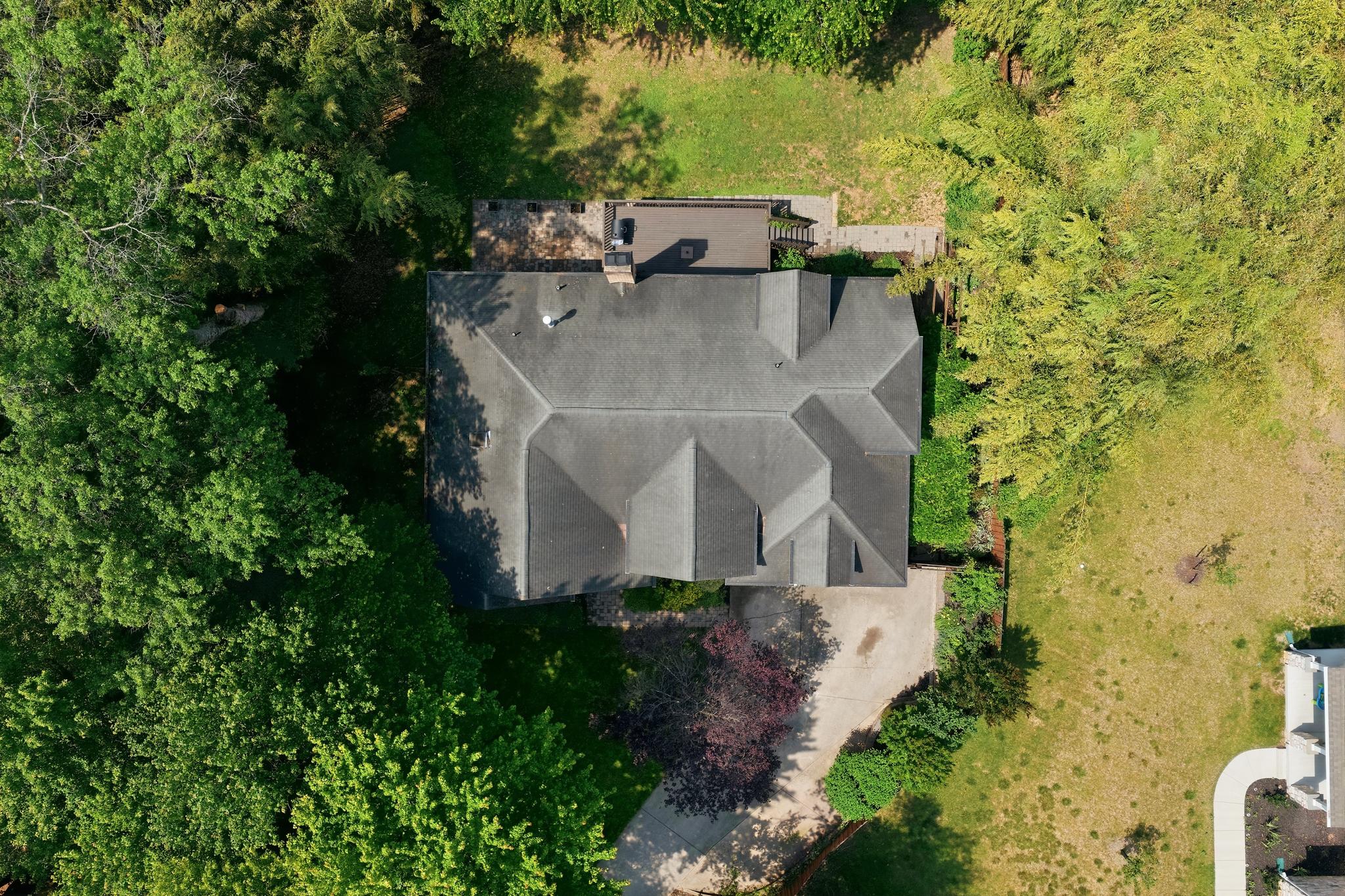 15802 Radwick Lane Silver Spring, MD 20906 - Photo 49 of 55 an aerial view of a house with yard and trees all around