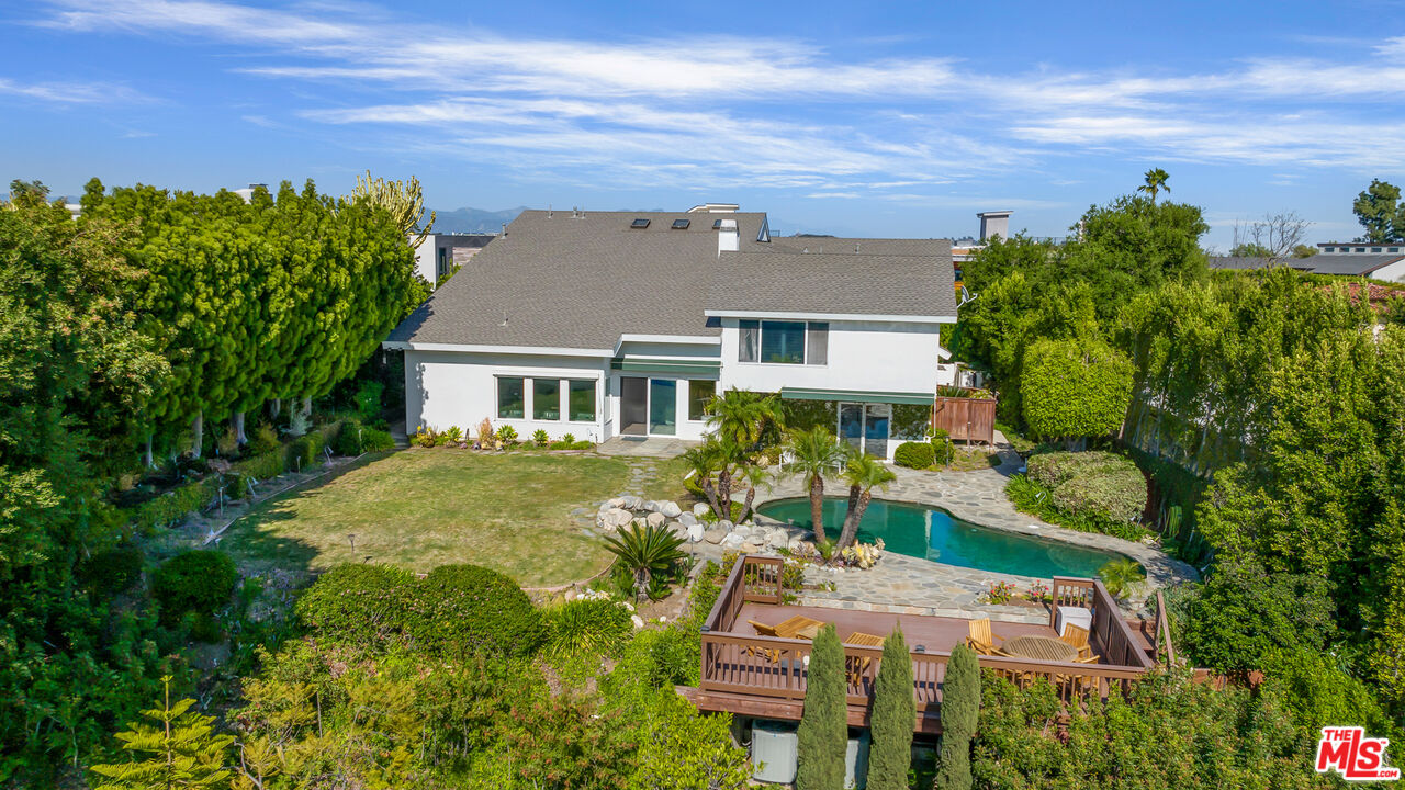 1641 Stradella Road Los Angeles, CA 90077 - Photo 1 of 23 a view of house with a yard