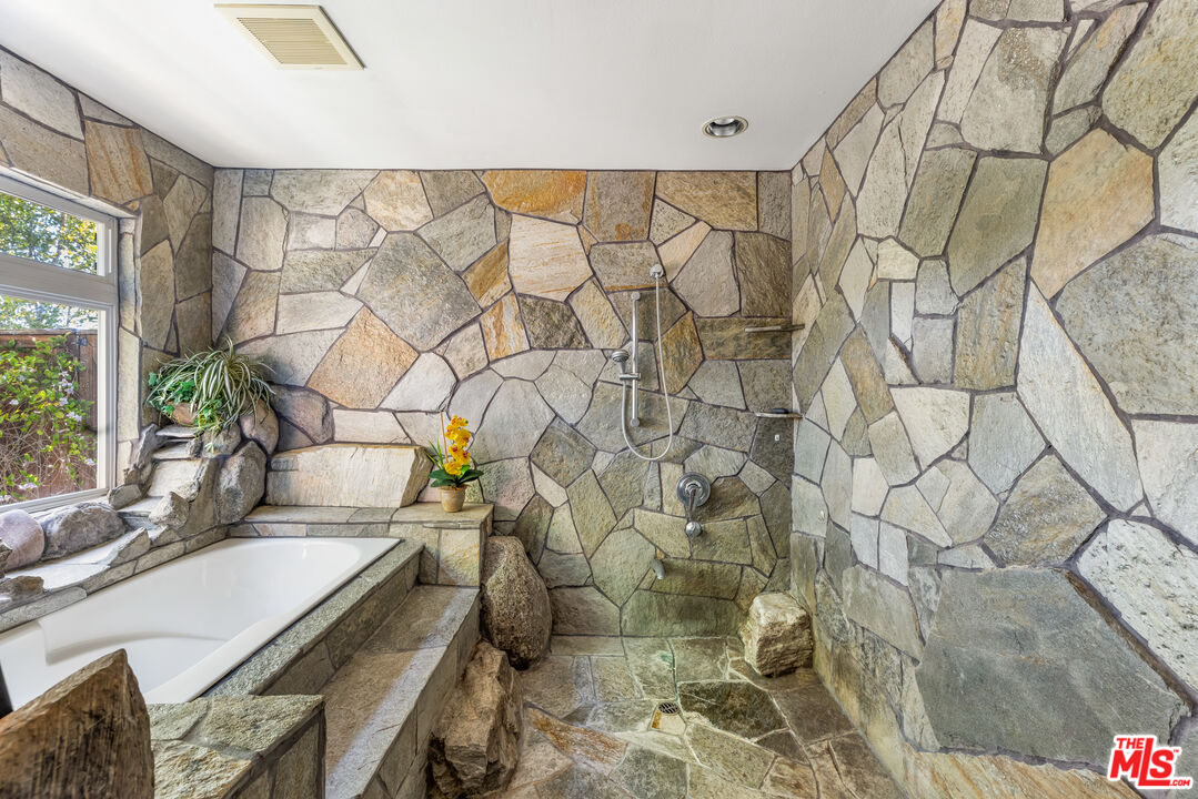 1641 Stradella Road Los Angeles, CA 90077 - Photo 13 of 23 a bathroom with a sink toilet and shower