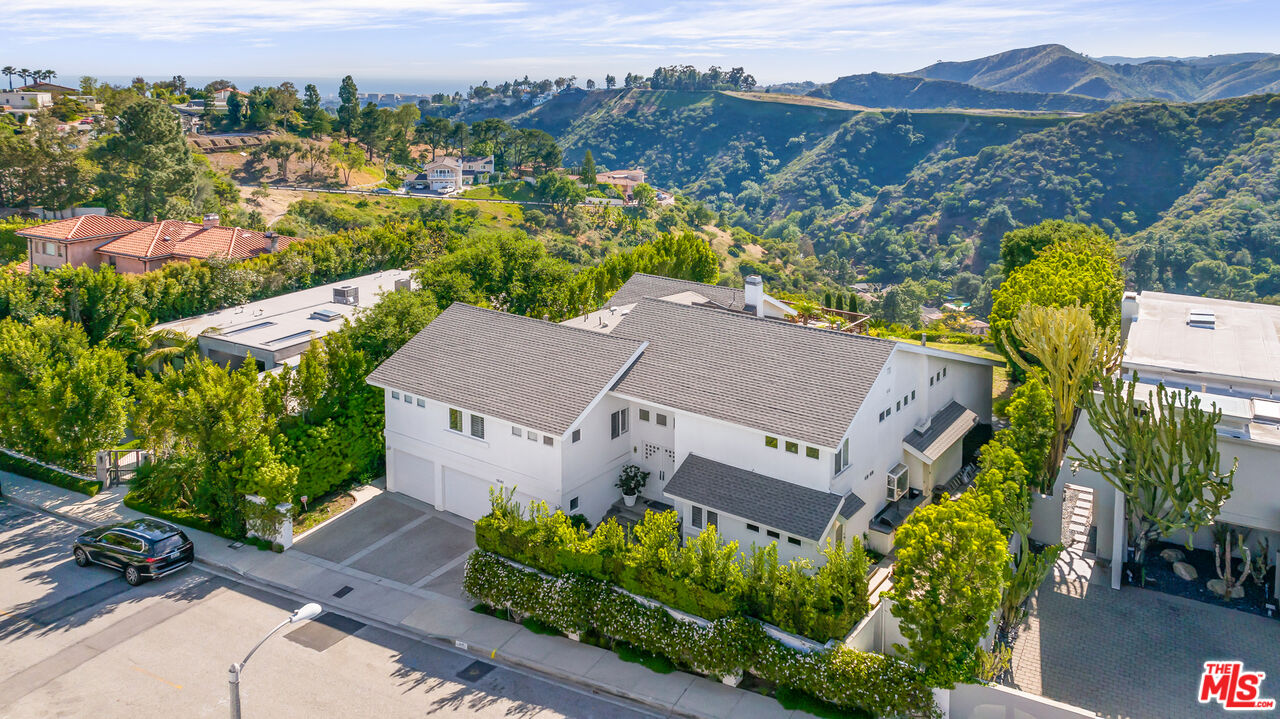 1641 Stradella Road Los Angeles, CA 90077 - Photo 22 of 23 an aerial view of a house with a garden