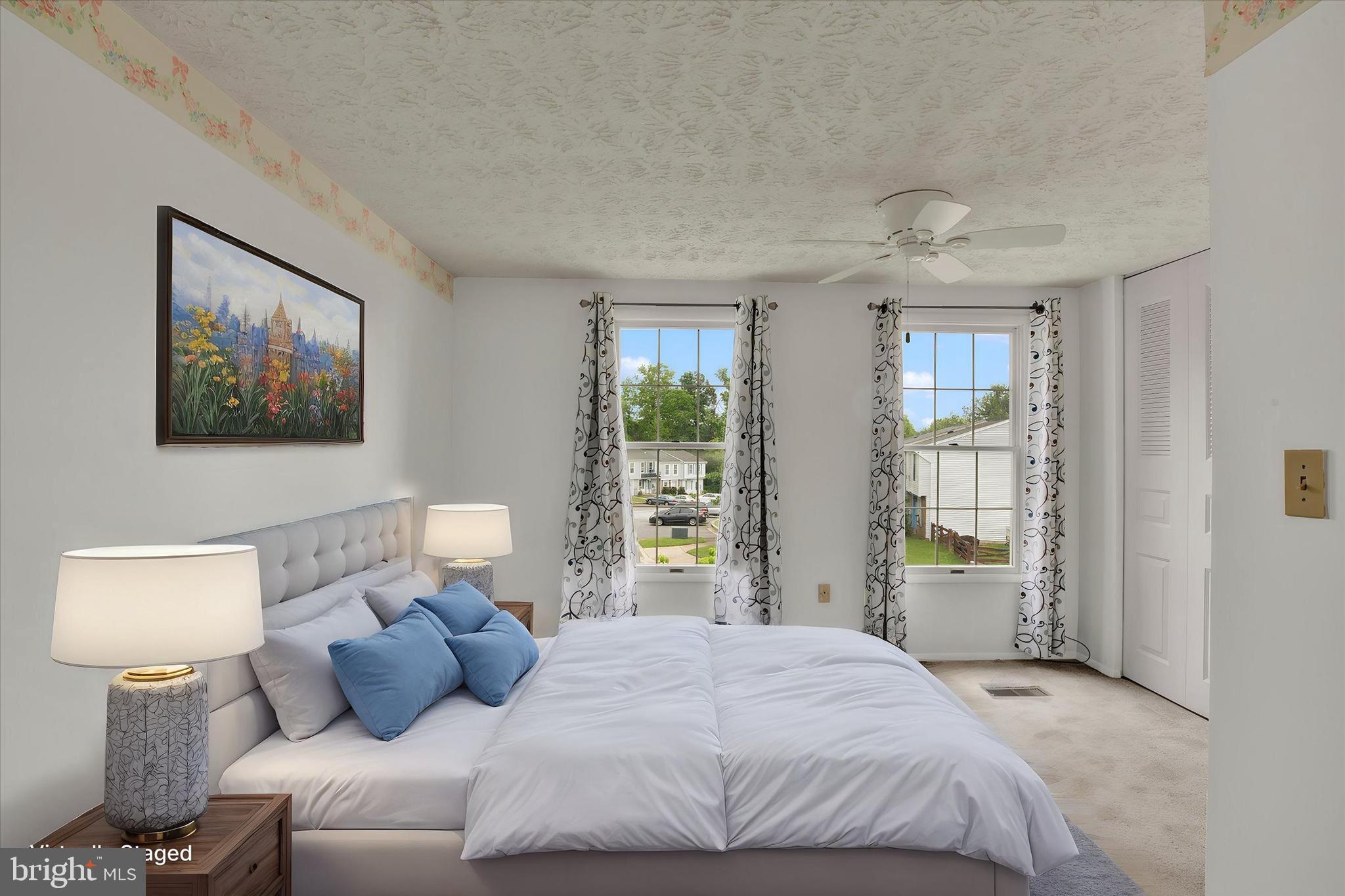 6 Stillwood Circle Nottingham, MD 21236 - Photo 11 of 21 a bedroom with a bed and a lamp on dresser