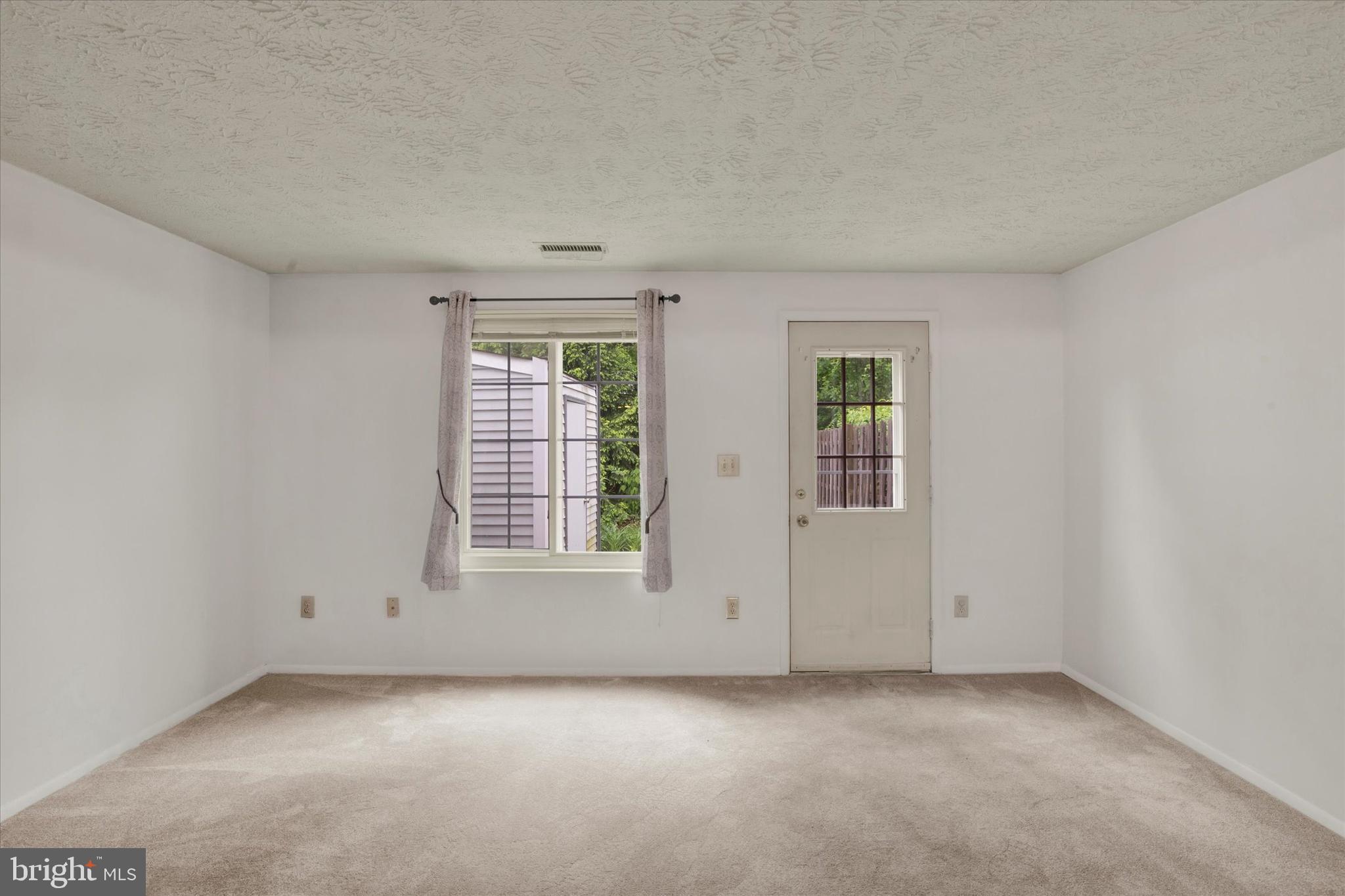 6 Stillwood Circle Nottingham, MD 21236 - Photo 9 of 21 an empty room with windows