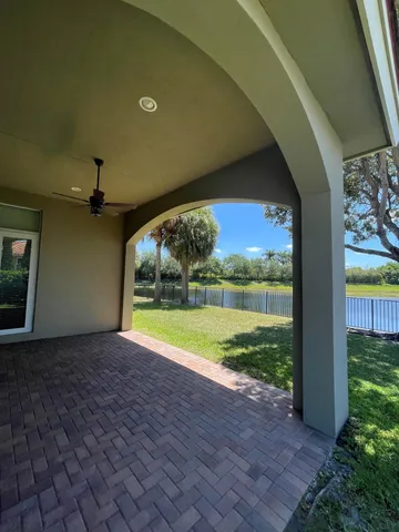 a view of a porch and garden