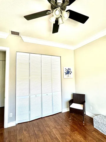 a living room with a bed