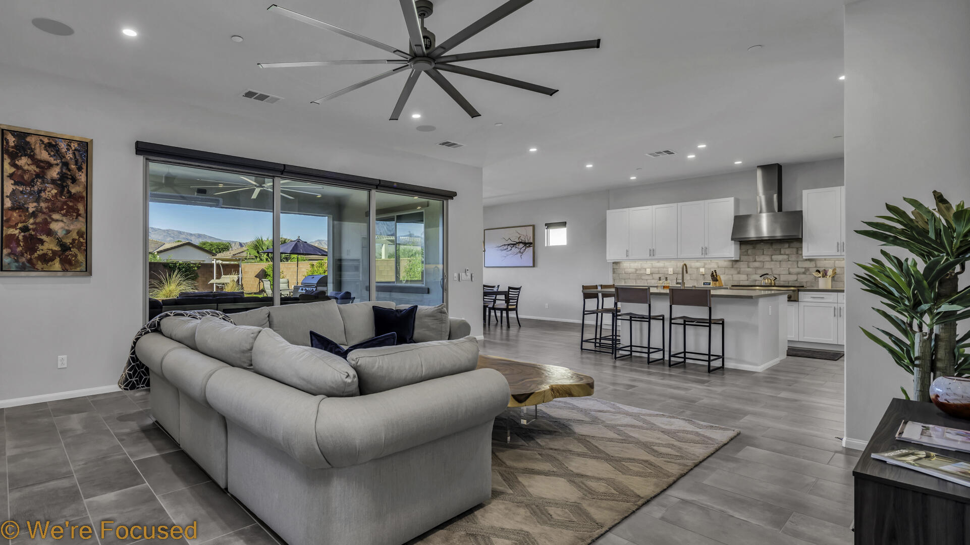 50845 Bee Canyon Drive Indio, CA 92201 - Photo 14 of 74 a living room with furniture and a large window