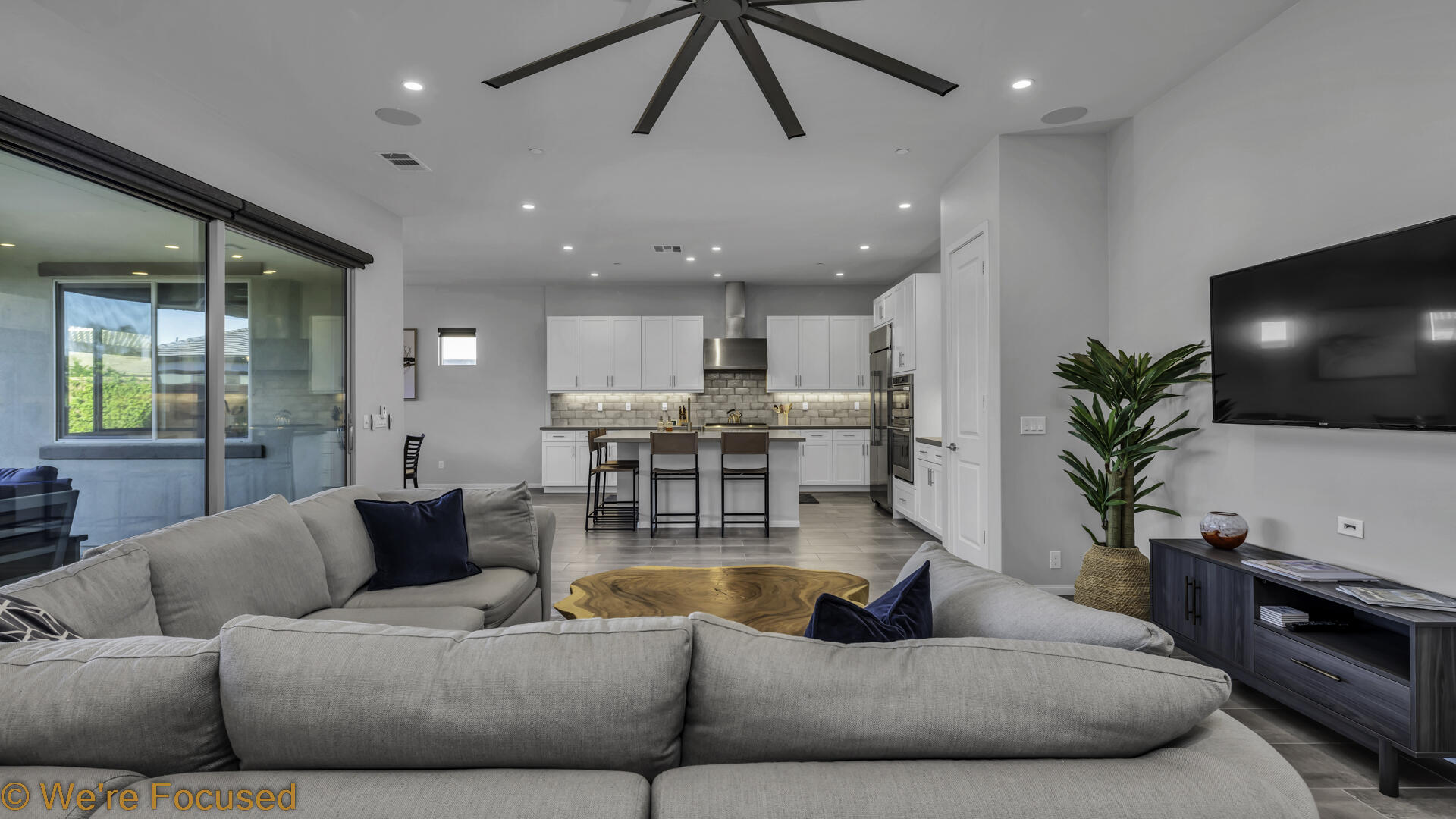 50845 Bee Canyon Drive Indio, CA 92201 - Photo 15 of 74 a living room with furniture kitchen view and a large window