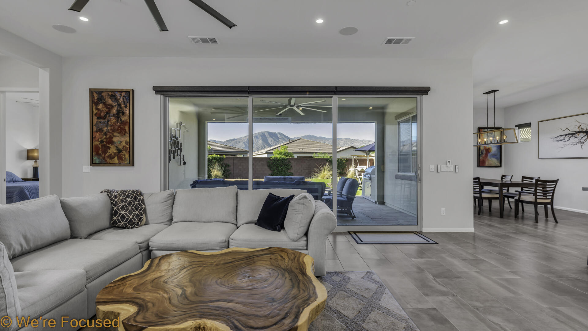 50845 Bee Canyon Drive Indio, CA 92201 - Photo 16 of 74 a living room with furniture and a table