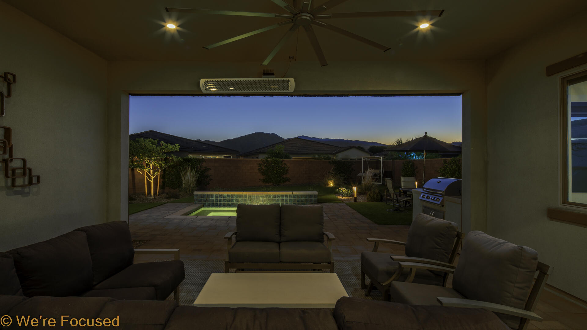 50845 Bee Canyon Drive Indio, CA 92201 - Photo 34 of 74 a living room with furniture and a lamp