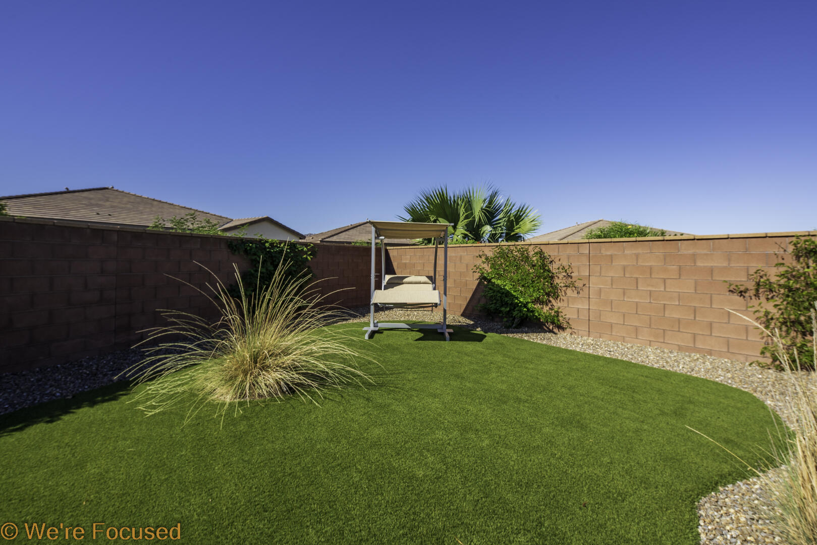 50845 Bee Canyon Drive Indio, CA 92201 - Photo 46 of 74 a view of a garden with a house in the background