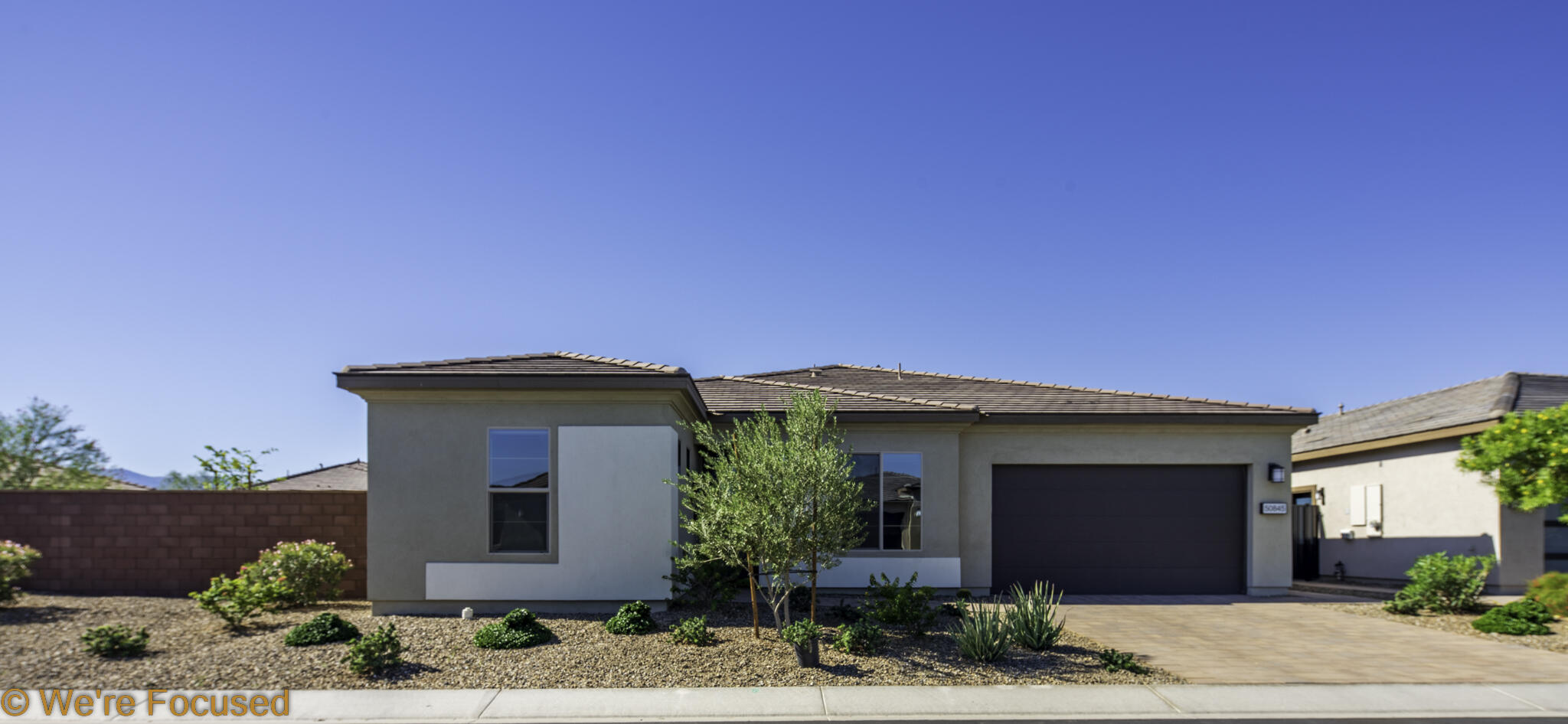 50845 Bee Canyon Drive Indio, CA 92201 - Photo 49 of 74 a front view of a house with a yard