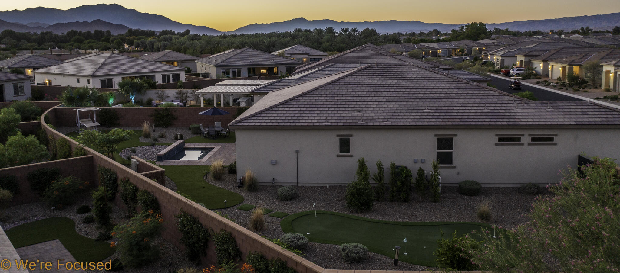50845 Bee Canyon Drive Indio, CA 92201 - Photo 55 of 74 a aerial view of a house next to a yard