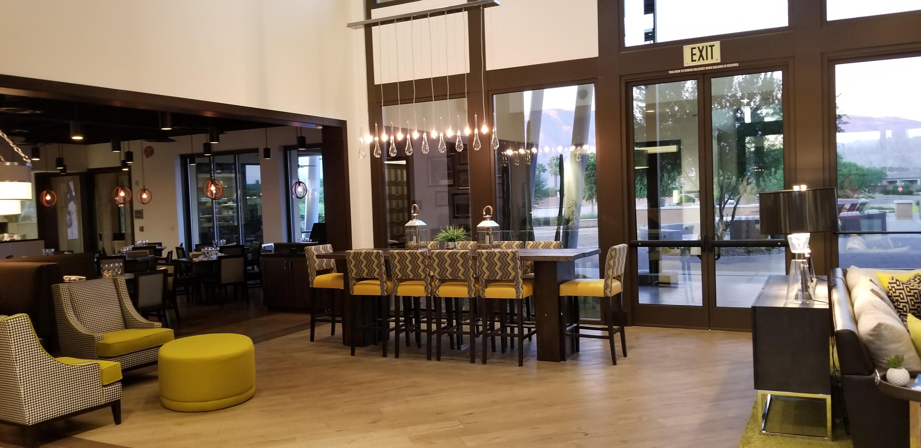 50845 Bee Canyon Drive Indio, CA 92201 - Photo 65 of 74 a view of a chairs and tables in patio and a patio