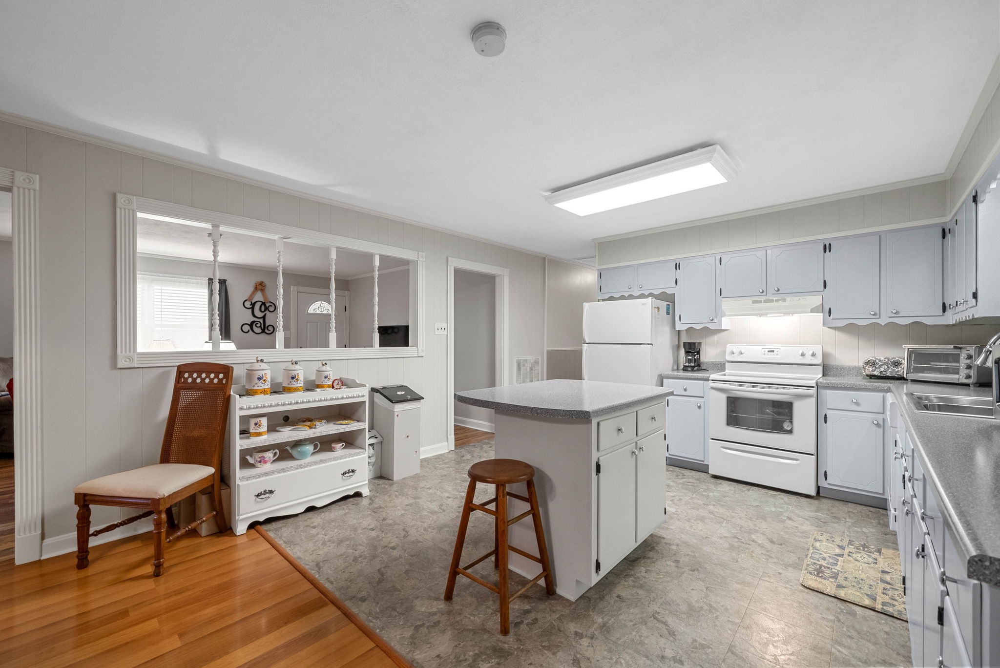 5675 Princeton Road Hopkinsville, KY 42240 - Photo 13 of 38 a kitchen with stainless steel appliances granite countertop a stove and cabinets